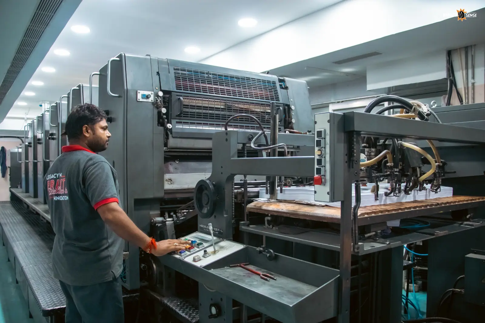PPML offset press in operation on the production floor.